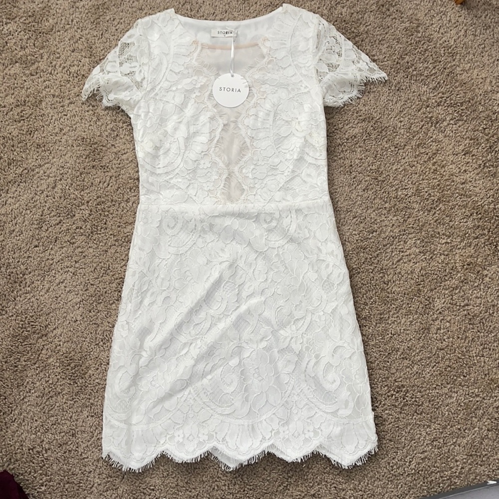 White lace dress with mesh front.